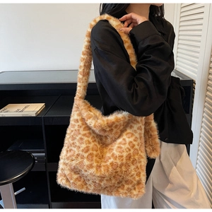 Side view of large leopard print plush tote bag showing capacity and soft texture
