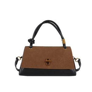 Chic black and brown suede patchwork square handbag with gold hardware and knot handle