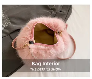 Detail view of pink faux fur bag interior showing soft lining and gold hardware