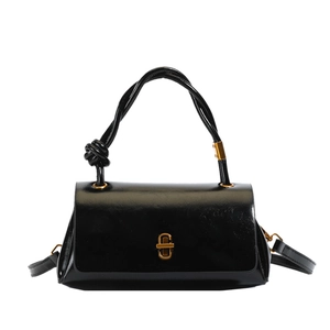 Elegant black patent leather shoulder bag with knotted handle and gold metal twist lock