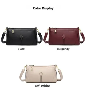 Detailed view of textured leather shoulder bags in black, burgundy, and off-white colors