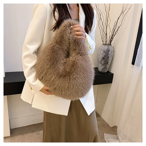 Detail shot of brown faux fur handbag texture and fluffy material on commute tote bag