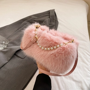 Pink faux fur handbag with pearl handle and crossbody strap for women fashion