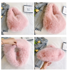Detailed view of the soft pink plush texture and handle on a fuzzy faux fur handbag