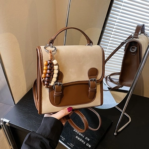 Borsa a tracolla vintage in pelle scamosciata beige con finiture in pelle marrone