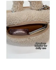 Macro detail of beige faux shearling mini bag showing inner storage with daily essentials