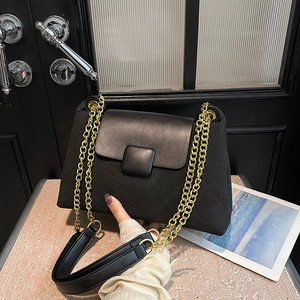 Classic black quilted shoulder bag with gold chain strap and elegant leather flap