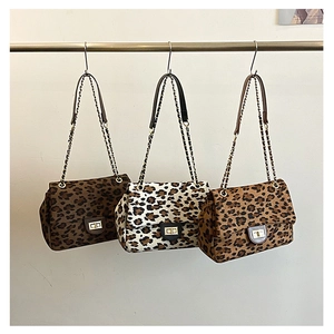 Three leopard print chain bags in coffee, cream and caramel with metal lock closure