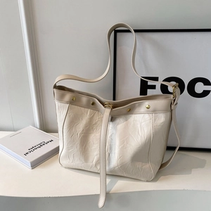 Retro cream off-white pleated shoulder bag with gold rivets and minimalist chic design