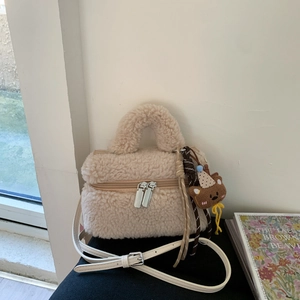 Chic cream white faux shearling mini handbag with double zippers and cute bear charm