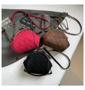 Quilted kiss-lock crossbody bags in burgundy, brown and black with metal chain straps
