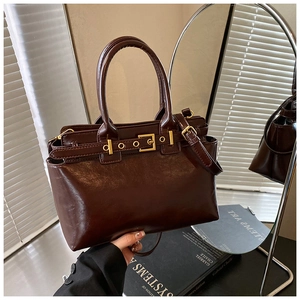 Retro dark brown tote bag with gold metal hardware for professional women work style