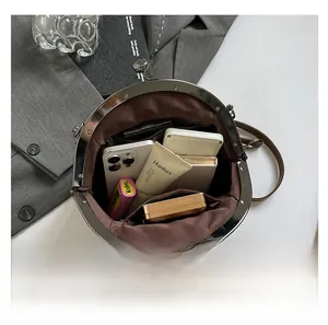 Top view showing the large capacity and interior compartments of this vintage shell bag