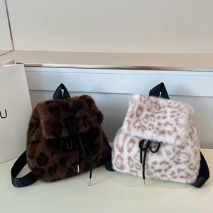 Faux fur leopard print drawstring backpacks in brown and cream for autumn fashion