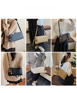 Style guide showing rectangular leather shoulder bags in six colors with heart charms
