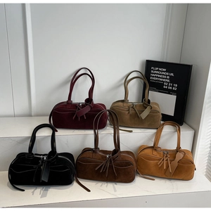 Multi-color suede matte boston bags with long shoulder straps and tassel details