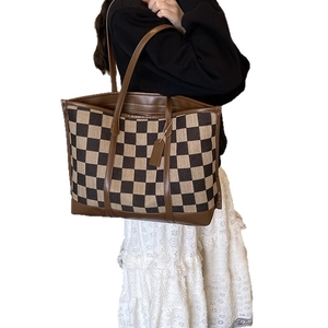 Retro checkered canvas tote bag with brown leather trim and long shoulder straps