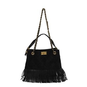 Black suede shoulder bag with quilted pattern, fringe trim and gold chain strap