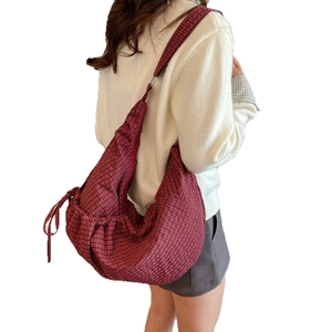 Red plaid crescent crossbody bag with adjustable drawstring and large capacity