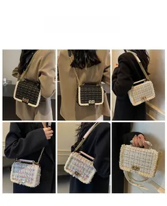 Detail of tweed chain bag featuring elegant pearl trim and metallic clasp closure