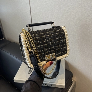Elegant black tweed shoulder bag with pearl trim and gold chain strap for women