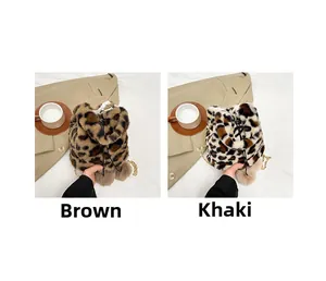 Detail of plush leopard print bucket bags in brown and khaki with chain straps