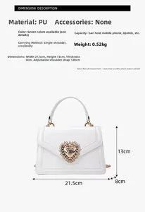White patent leather bag detail with heart-shaped pearl rhinestone buckle and Sizing info
