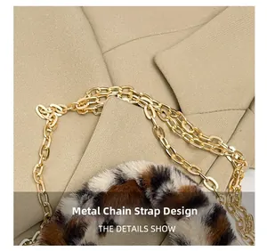 Detailed macro view of gold multi-layered chain strap on leopard print plush bag