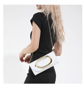 White rectangle flap crossbody bag with a large gold oval buckle and fine chain strap