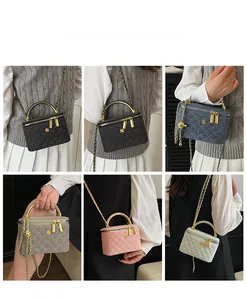 Detail of quilted leather texture and golden floral clasp on chic crossbody bag