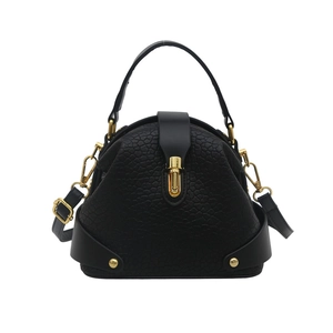 Classic black leather crossbody satchel bag with gold hardware and top handle for women