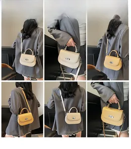 Detailed views of crossbody saddle bags in cream and yellow with metal twist locks