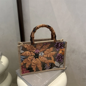 Linen tote bag with sequined flower embroidery and natural bamboo top handles