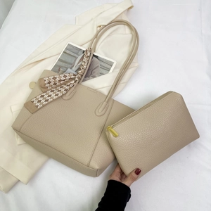 Chic apricot tote bag set with textured leather, checkered scarf, and matching pouch