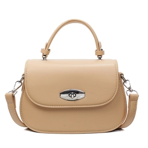 Minimalist beige saddle bag with silver oval lock and adjustable shoulder strap