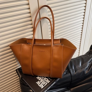 Brown leather tote bag with FASHION lettering and long shoulder straps in a modern style