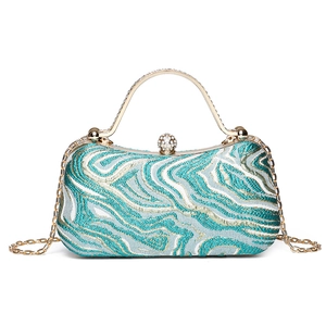 Fashionable candy green evening bag with wavy embroidery and rhinestone handle chain