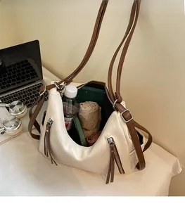 Interior view showing large capacity of the tote bag with daily essentials inside