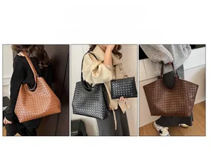Detail view of woven leather tote and matching pouch set in black, tan and dark brown
