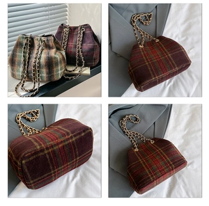 Detail of vintage wool plaid bucket bag with metallic chain drawstring closure