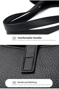Detailed view of reinforced dual handles and stitching on black litchi pattern tote bag