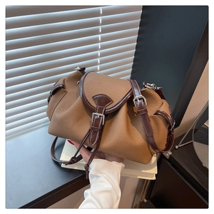 Borsa a spalla retrò in tela marrone con patchwork in pelle e chiusura con coulisse