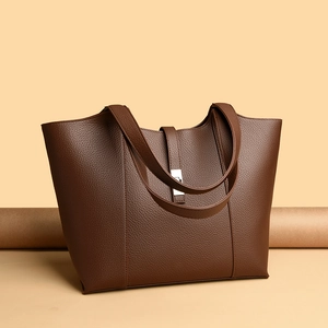 Chocolate brown lychee pattern leather tote bag with silver metal lock for commuting