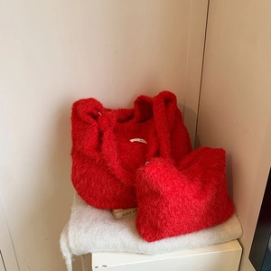 Red plush tote and pouch set in soft faux fur with winter aesthetic on white background