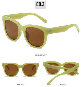Three-view display of green oversized sunglasses with matte frames and brown lenses