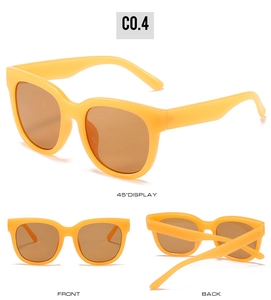 Detailed views of bright yellow oversized square sunglasses with brown UV400 lenses