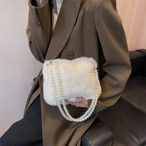 Elegant white plush shoulder bag with pearl chain handle for women in autumn and winter