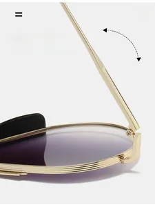 Macro view of durable golden metal hinges and purple gradient lenses on aviator sunglasses