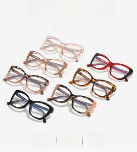 Detailed close-up of multiple stylish large TR90 cat-eye eyewear frames in various colors