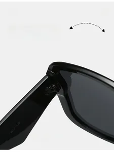 Macro shot of durable metal hinge on black square oversized sunglasses frames